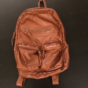 Brown leather backpack